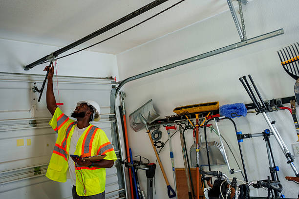 Professional Garage Door Spring Repair technician working in Belle Plaine, KS